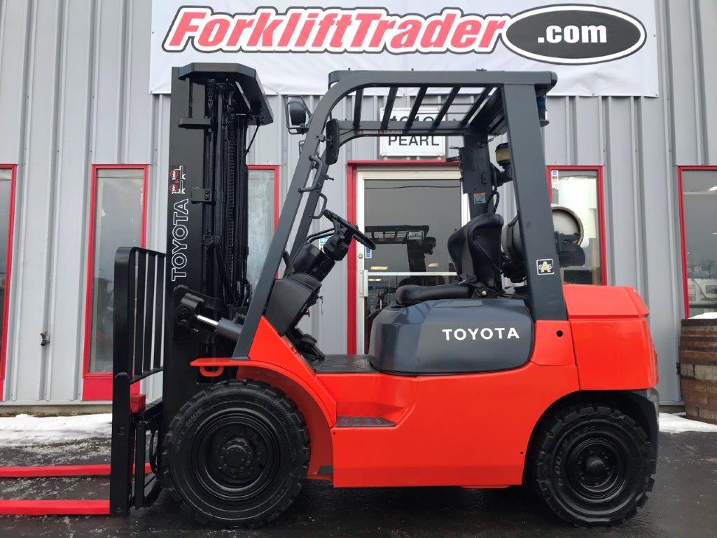 2006 orange toyota forklift with all new solid pneumatic tires for sale